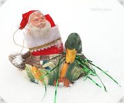 [Santa riding duck]