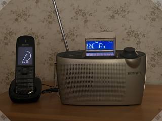 [Radio display alongside telephone]